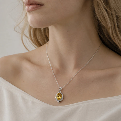 A Little Longer in the Sun — yellow topaz pendant, AI-assisted editorial wearing view, cropped blonde editorial v3