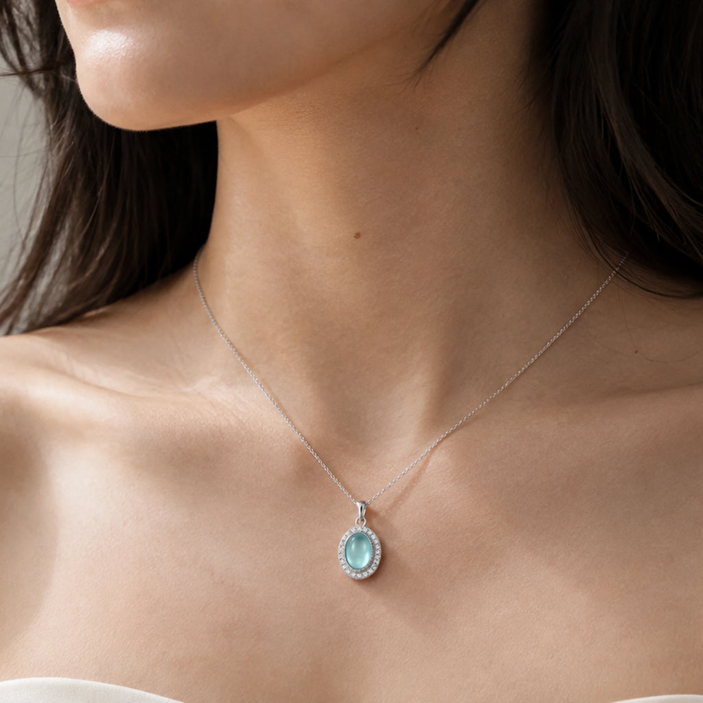 Before the City Wakes — aqua aquamarine pendant, AI-assisted editorial wearing view [asset:6af8c435d49c]
