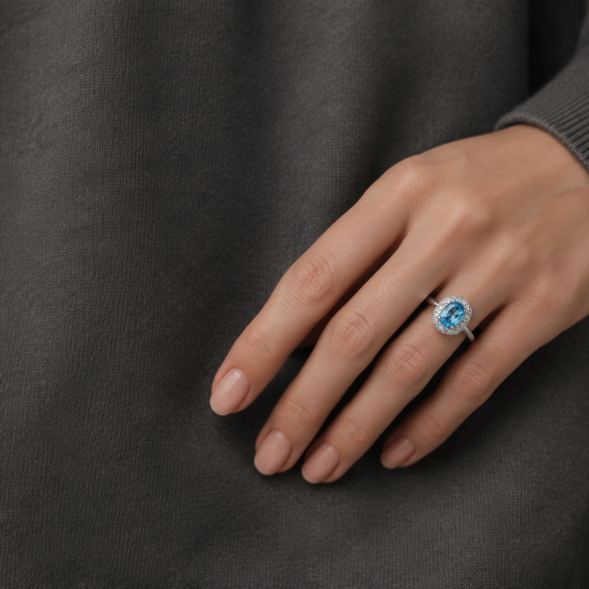 The Morning We Stayed — blue topaz ring, AI-assisted editorial wearing view [asset:65e9be33282f]