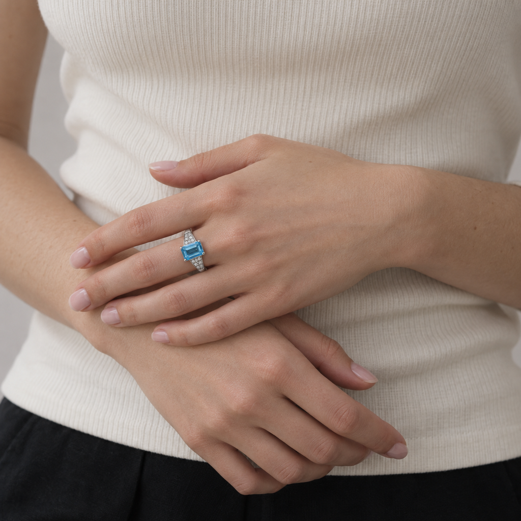 The Seat Beside Mine — blue topaz ring, AI-assisted editorial wearing view [asset:0dc254a84e91]