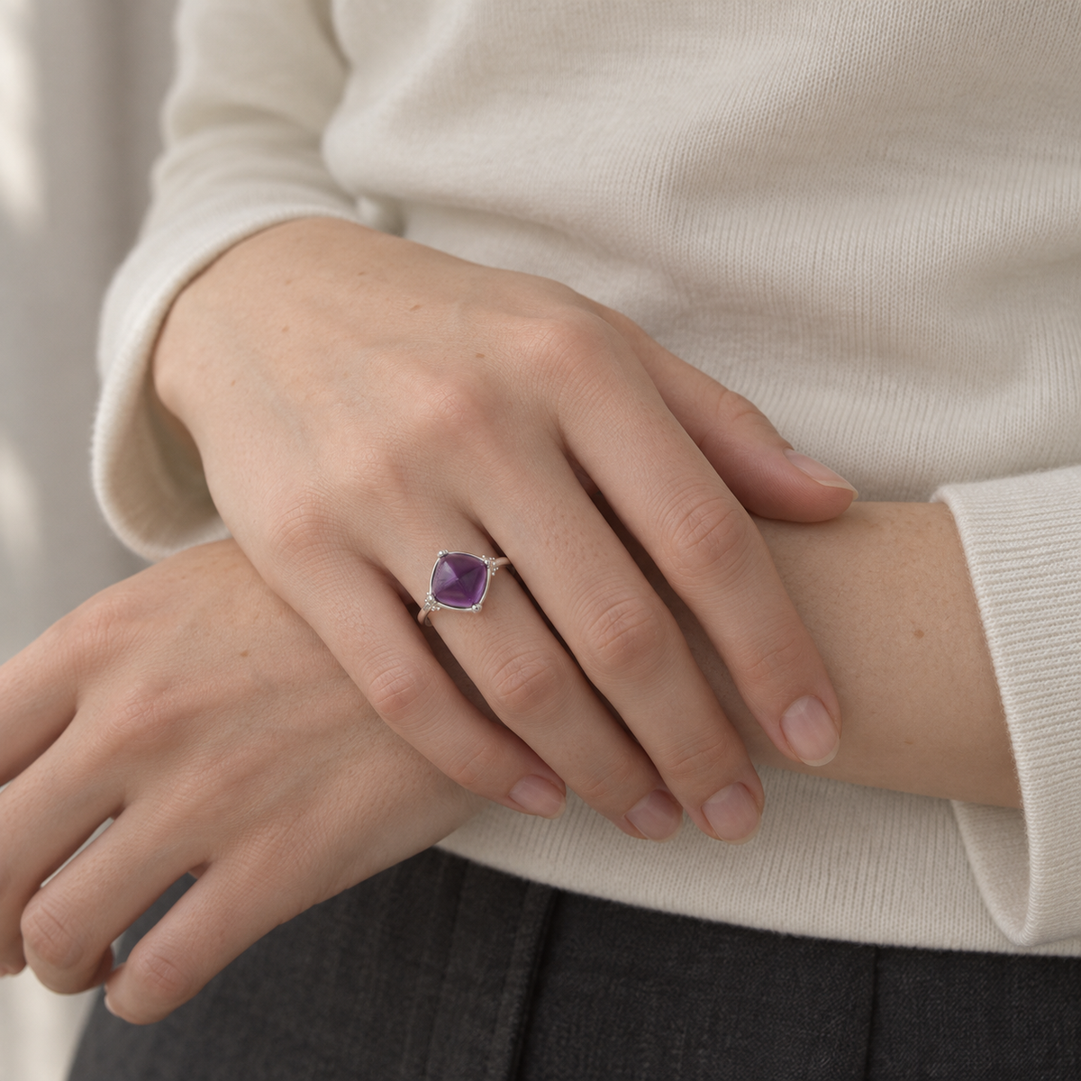 The Unfinished Crossword — violet amethyst ring, AI-assisted editorial wearing view [asset:434bff75ecfc]