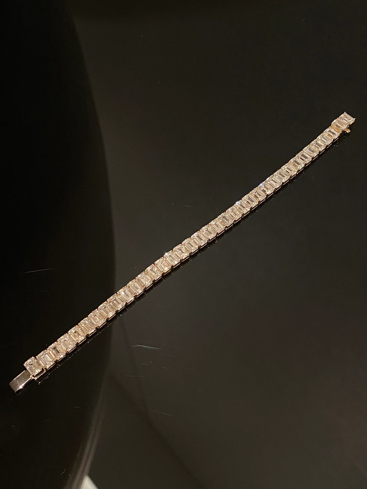 Emerald-cut diamond tennis bracelet in 14K yellow gold, original view 1