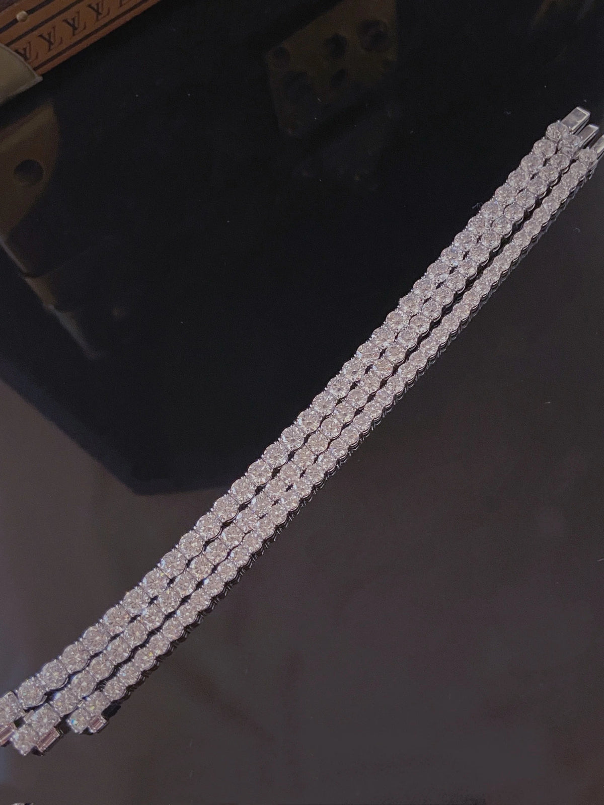 Round diamond tennis bracelet in 18K white gold, original view 2