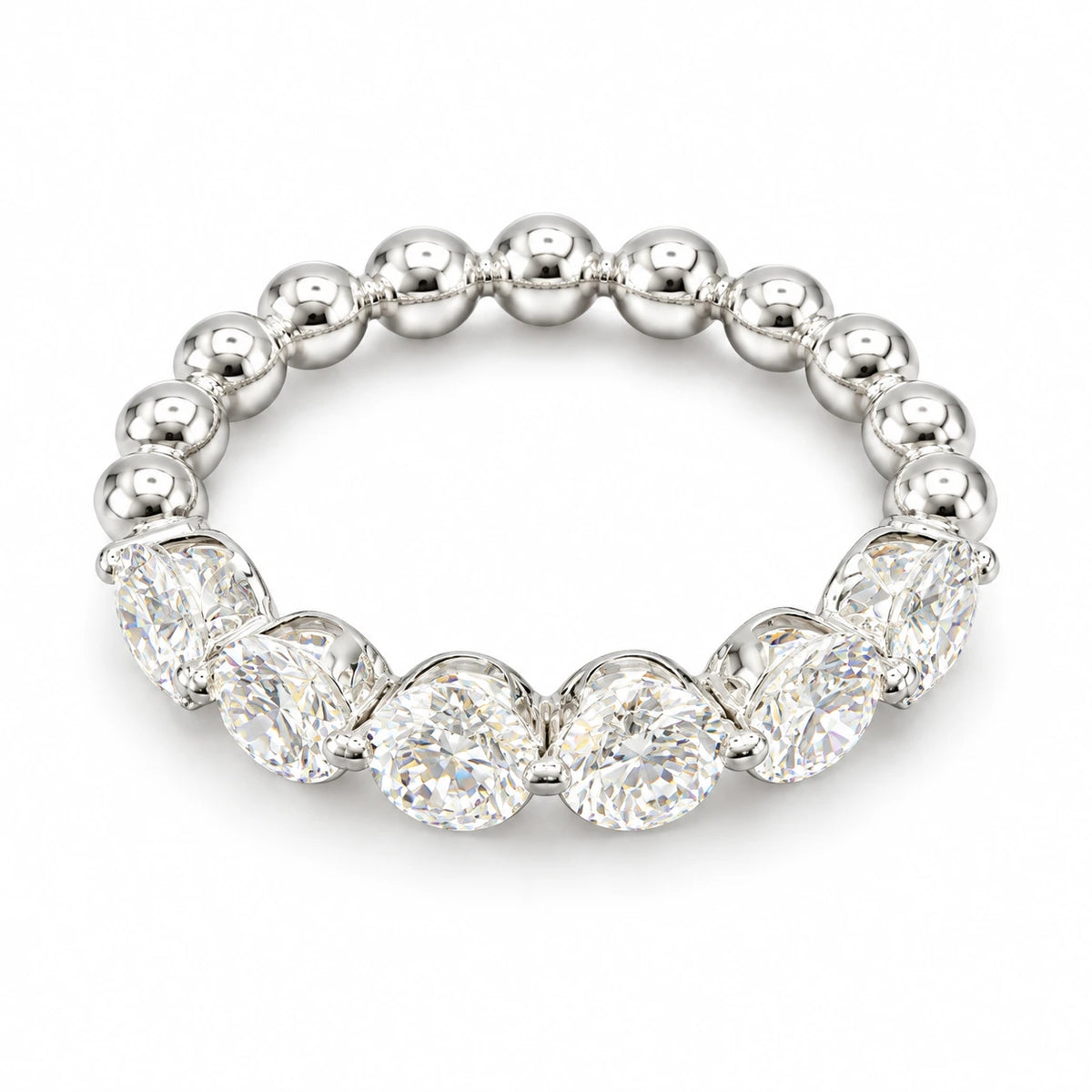 Six round-cut lab-grown diamonds set in an 18K white gold beaded band on white background