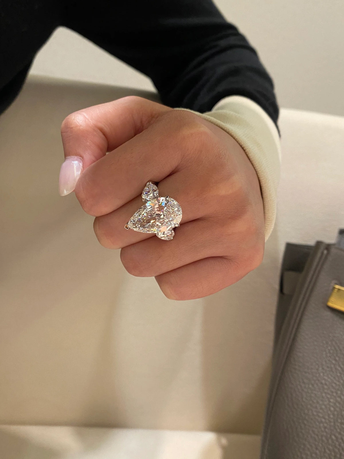 Pear-cut diamond ring with two accent diamonds in 18K white gold, original view 3