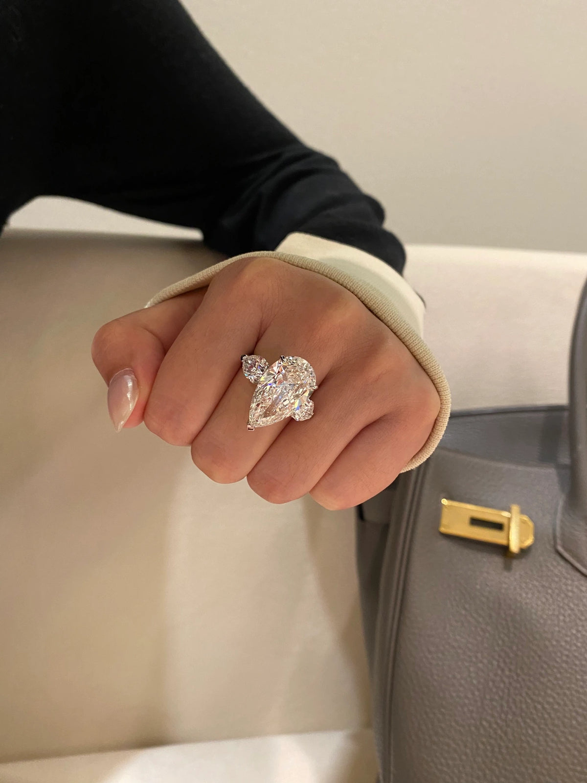 Pear-cut diamond ring with two accent diamonds in 18K white gold, original view 5