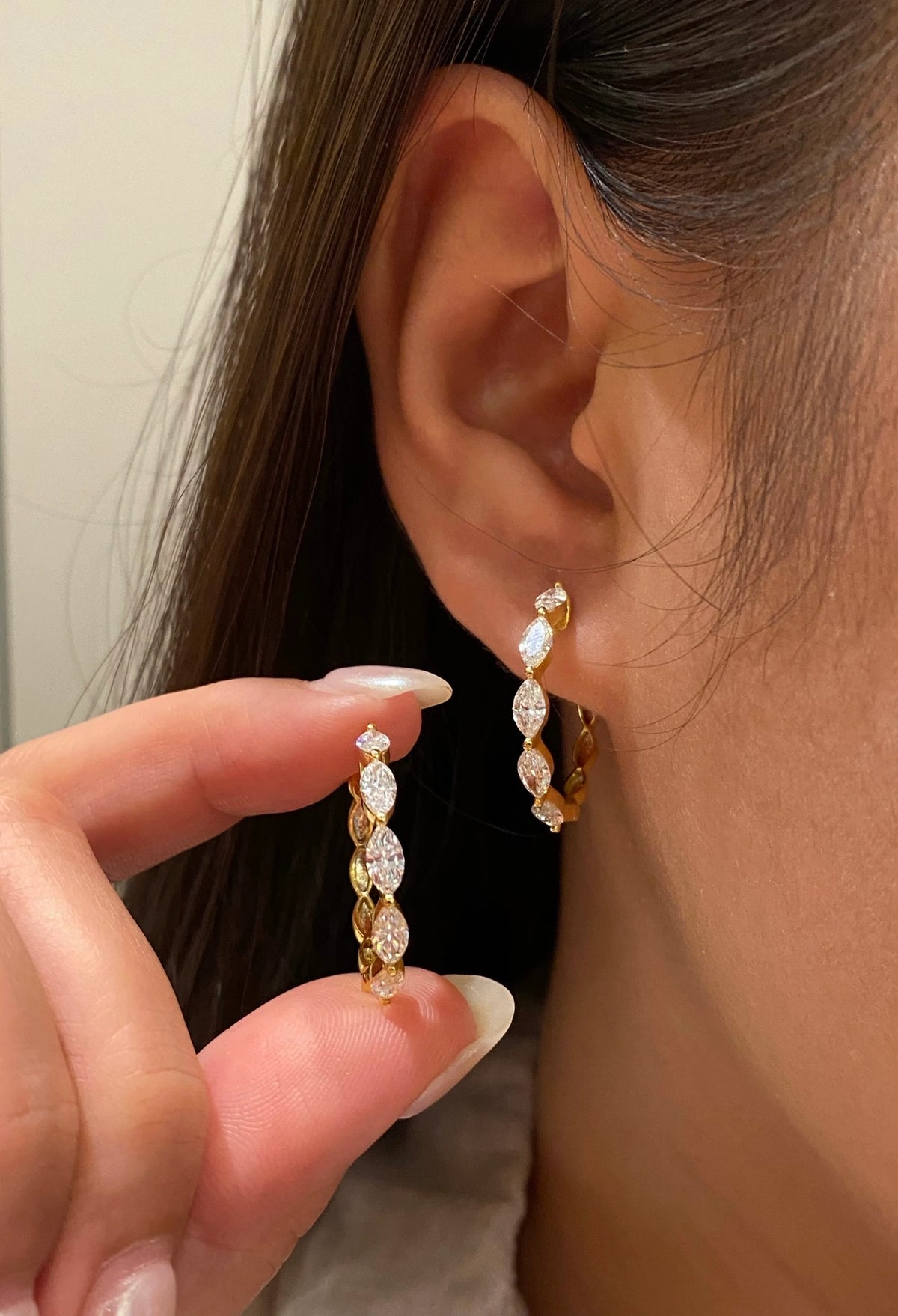 Marquise-cut diamond hoop earrings in 18K yellow gold, wearing view 9