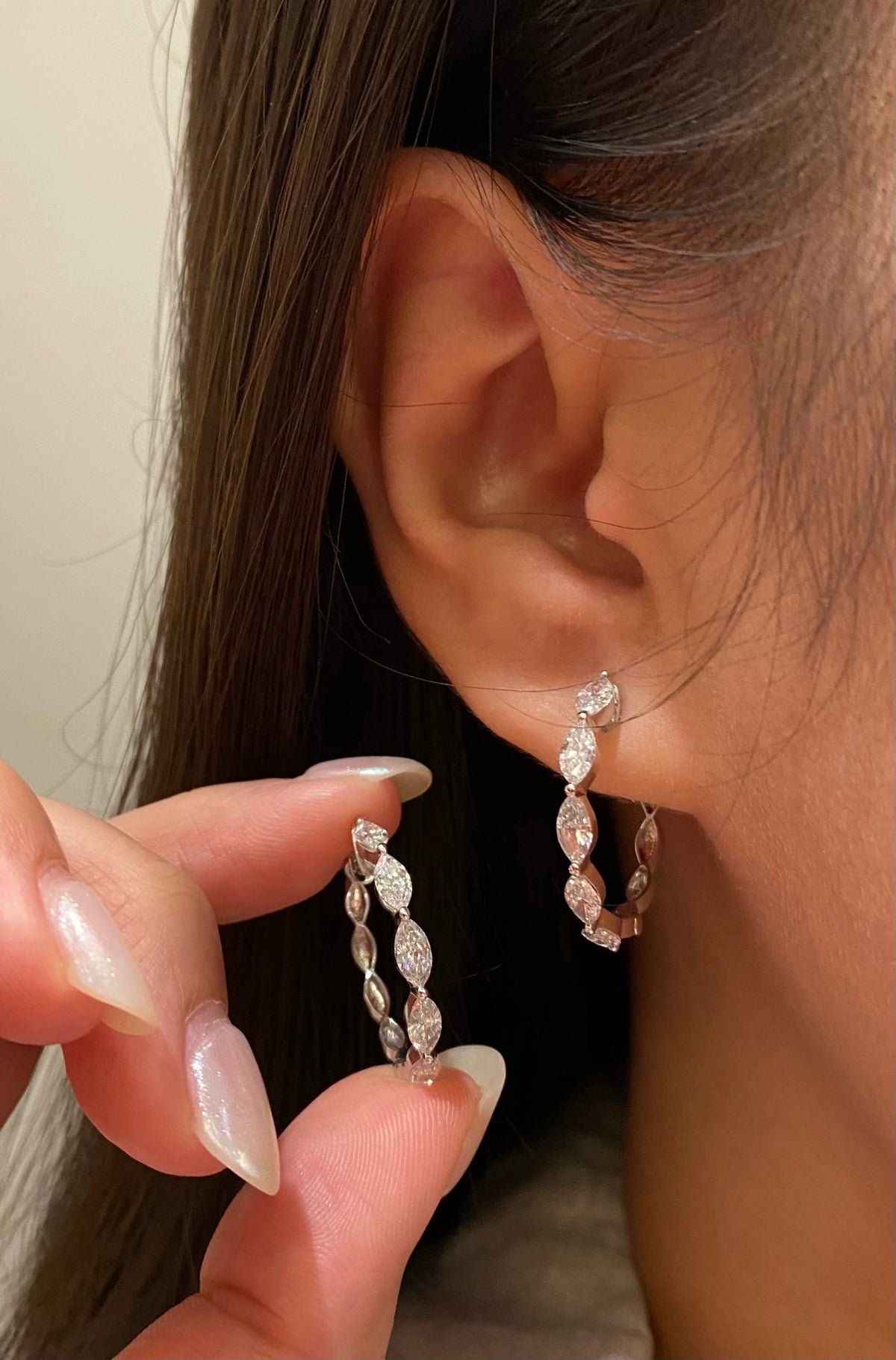 Marquise-cut diamond hoop earrings in 18K white gold, wearing view 6