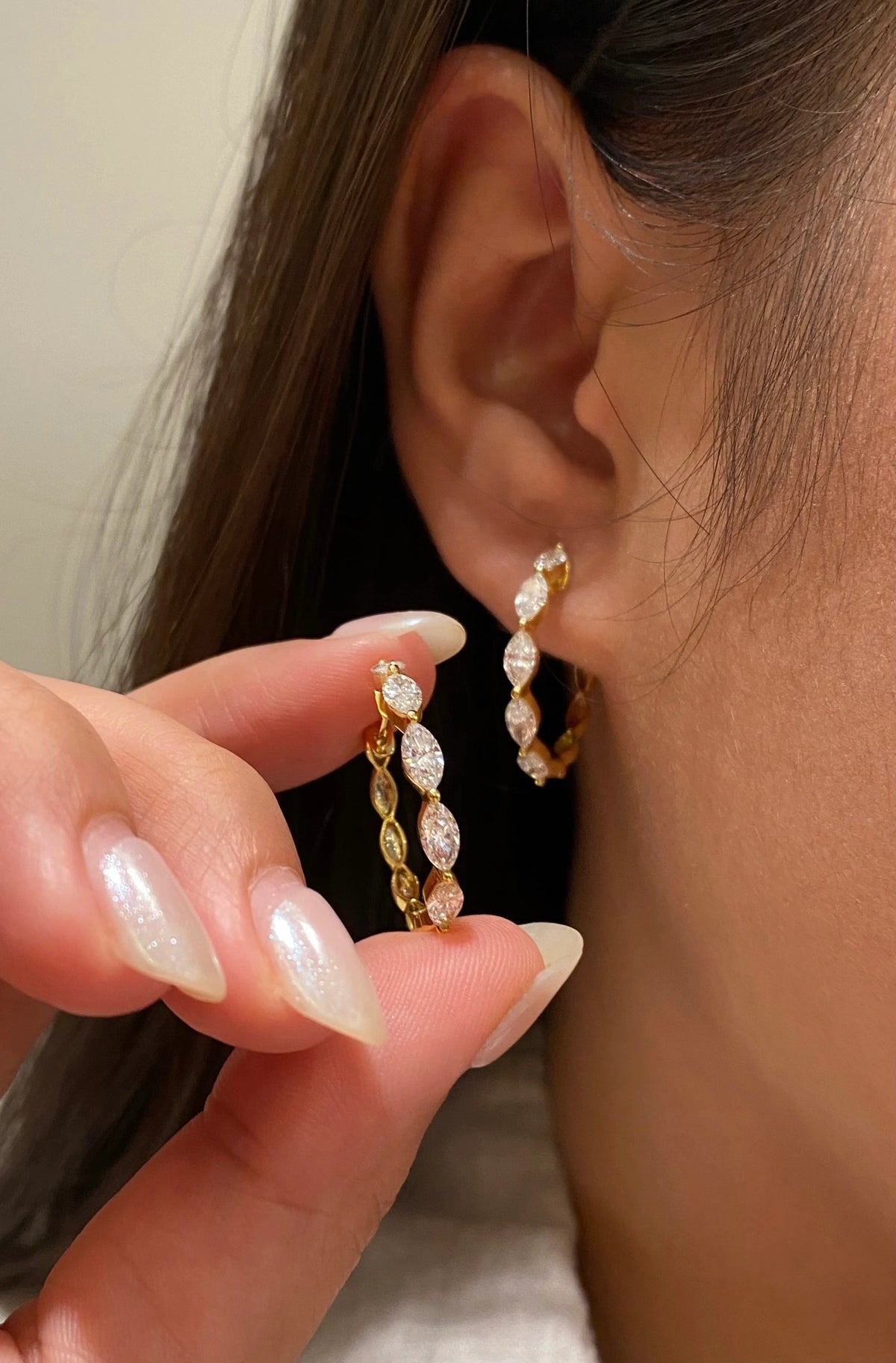 Marquise-cut diamond hoop earrings in 18K yellow gold, wearing view 8