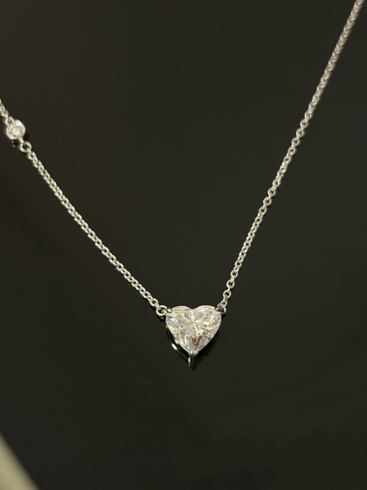 Heart-cut lab-grown diamond necklace with a round diamond accent, original detail view 2