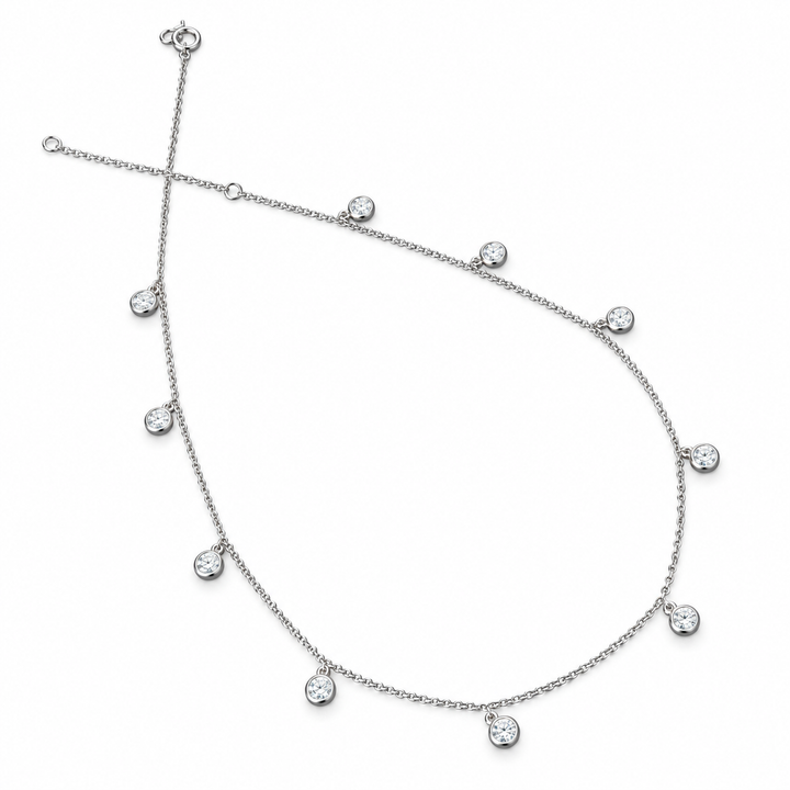 Ten round lab-grown diamond drops on a 18K white gold necklace, white background