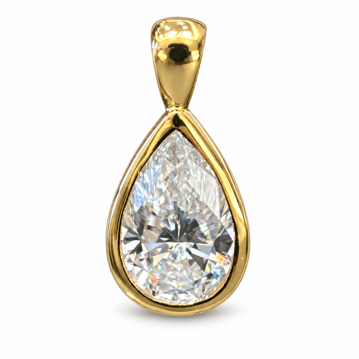 Pear-cut lab-grown diamond in an 18K yellow gold bezel pendant, white background