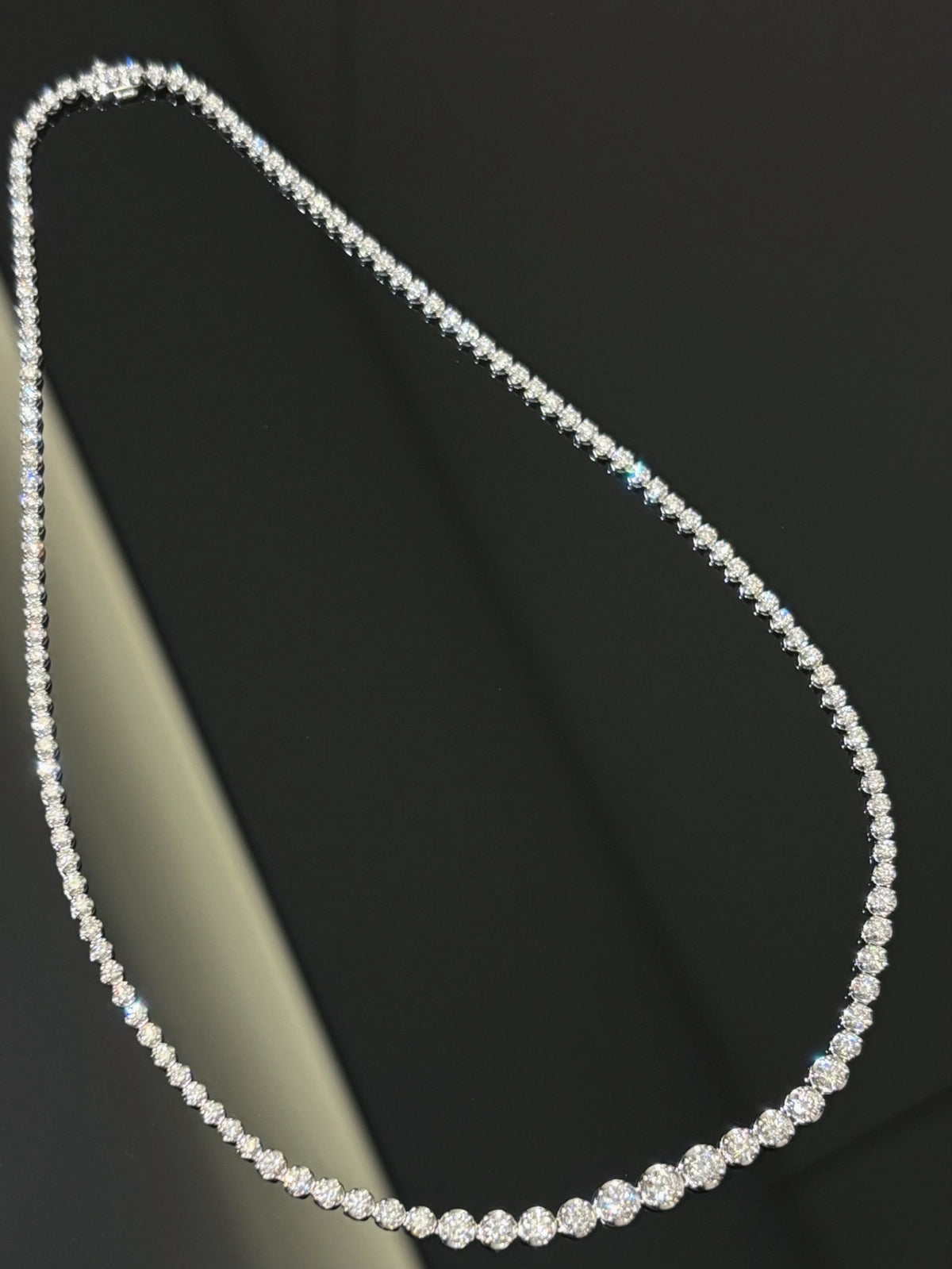 Graduated round diamond tennis necklace in white metal, complete original product view
