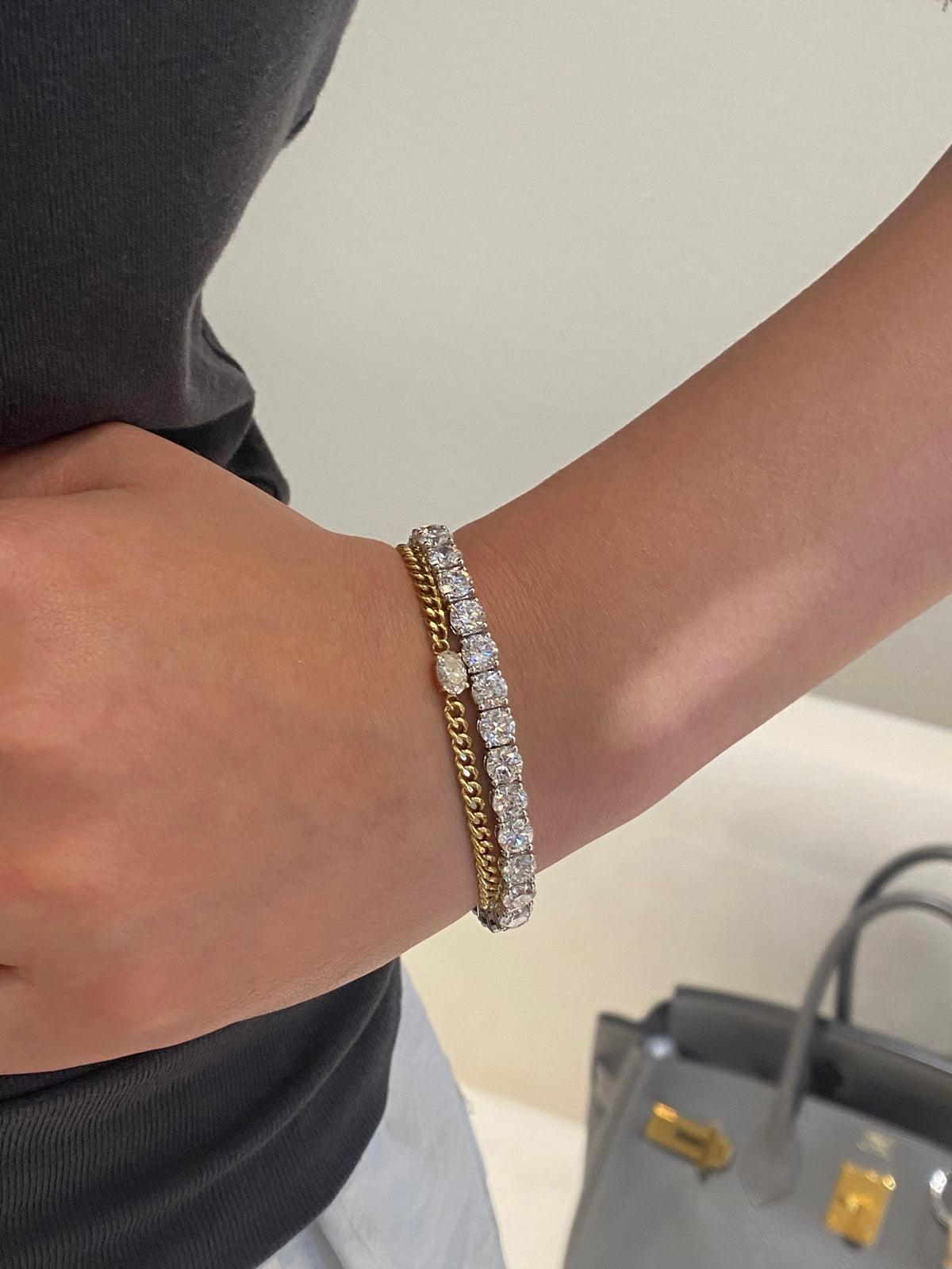 Larger white-metal round diamond tennis bracelet, original wearing detail; separate gold chain bracelet not included