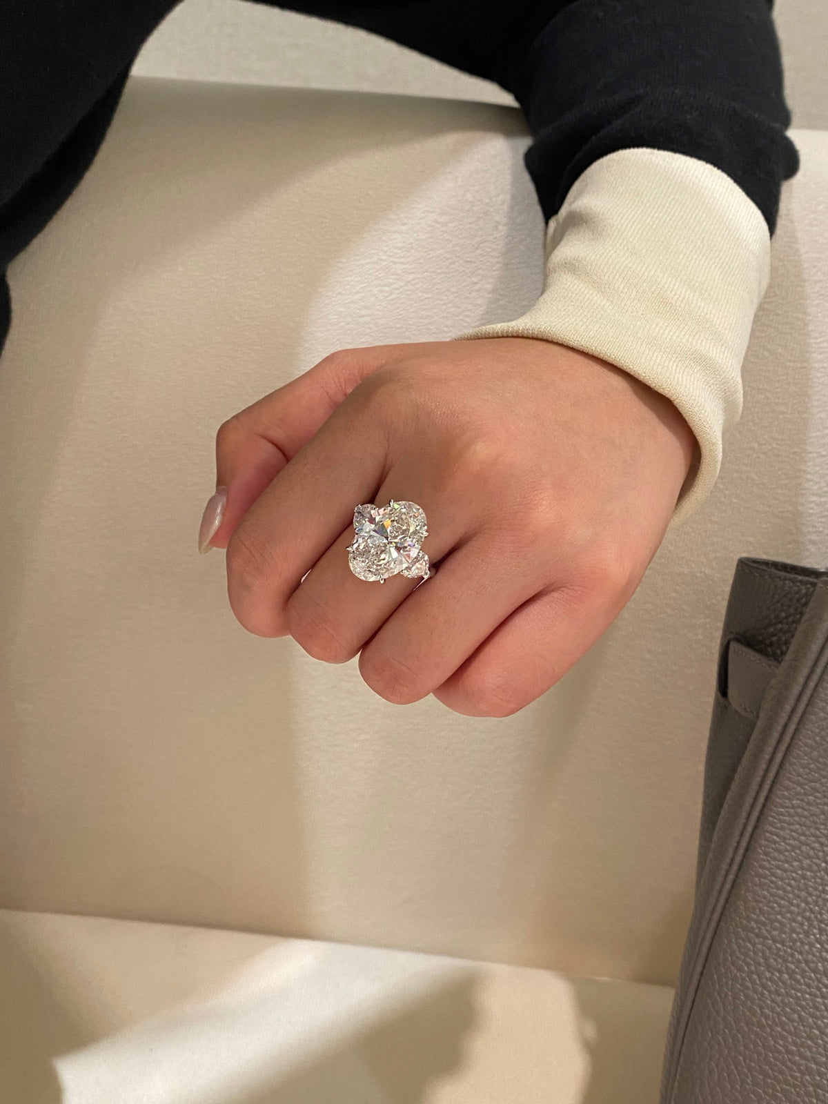 Oval and heart three-stone lab-grown diamond ring in white metal, original wearing view 2