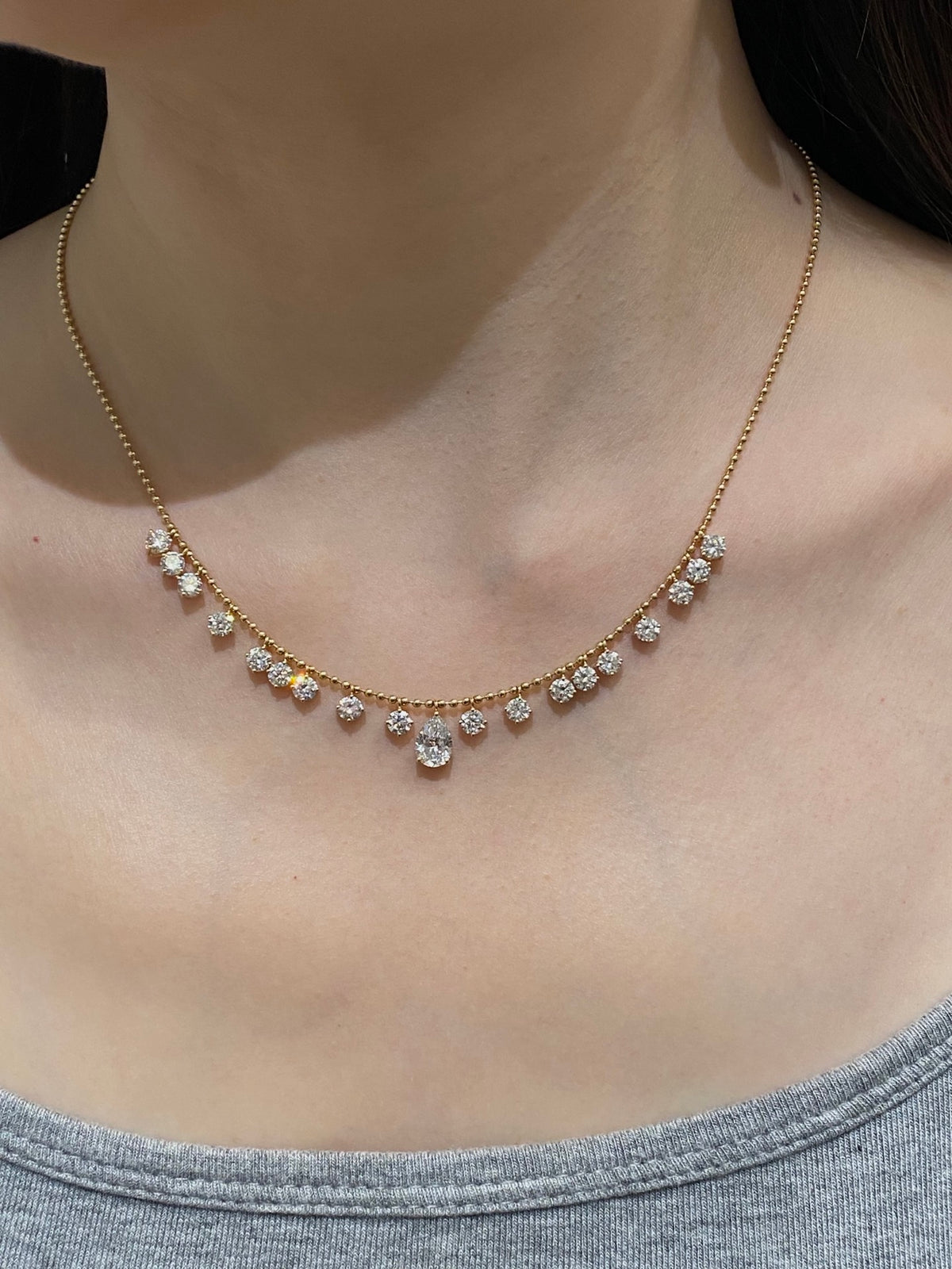 Pear and round lab-grown diamond bead-chain necklace, original wearing view 3