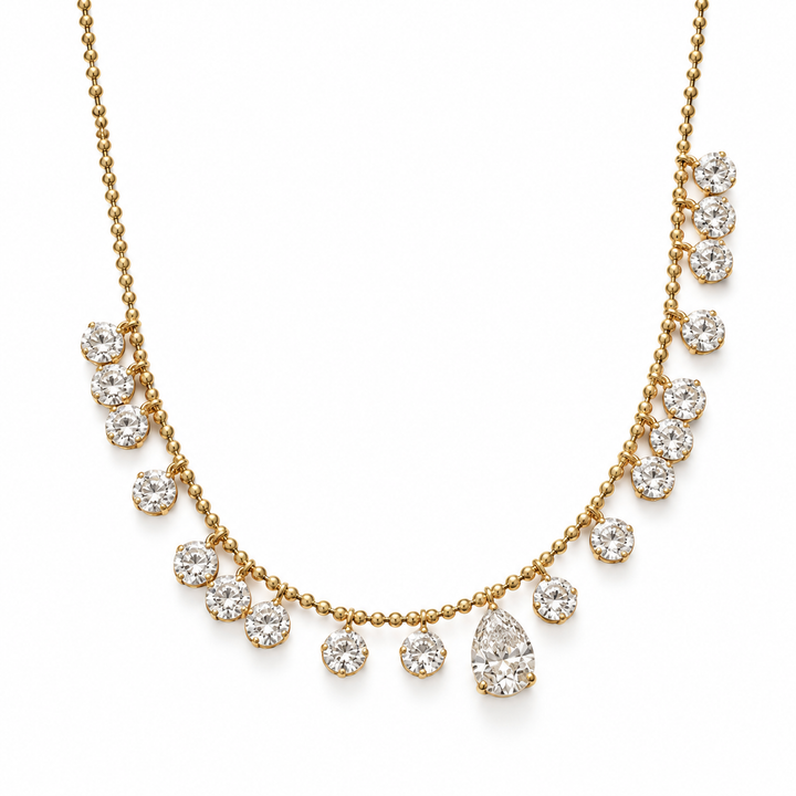 Pear and round lab-grown diamond beaded necklace in 18K yellow gold, white background