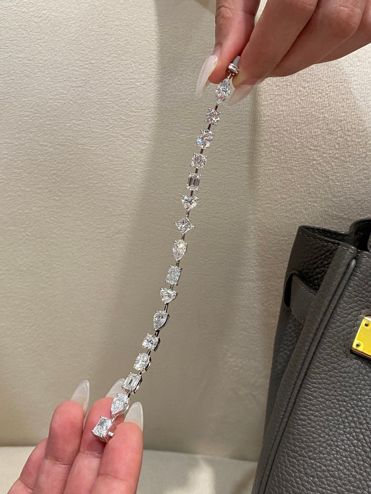 Mixed-cut lab-grown diamond bracelet in white metal, original handheld extended view