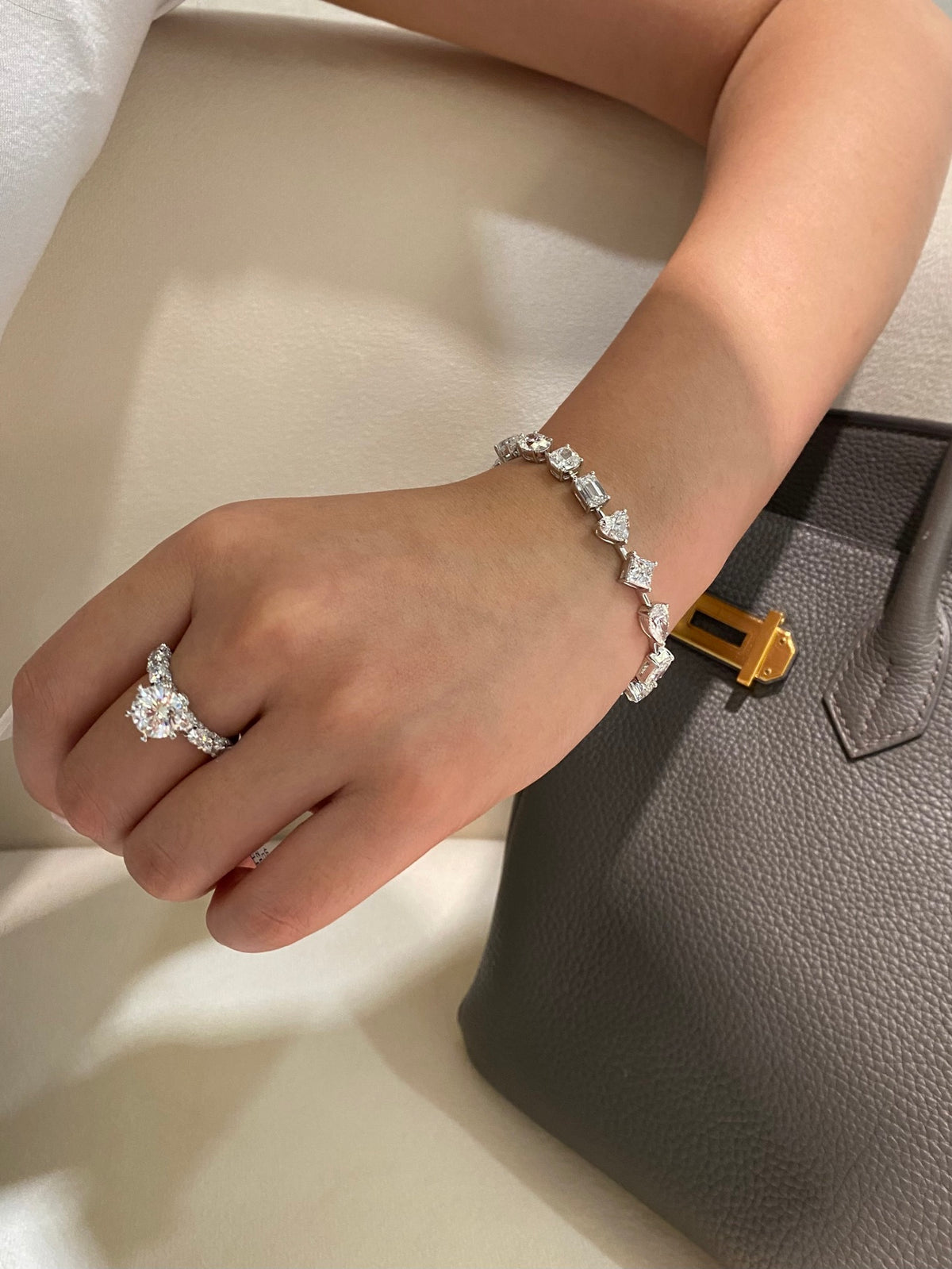 Mixed-cut lab-grown diamond bracelet in white metal, original wearing view 1; ring and other accessories not included