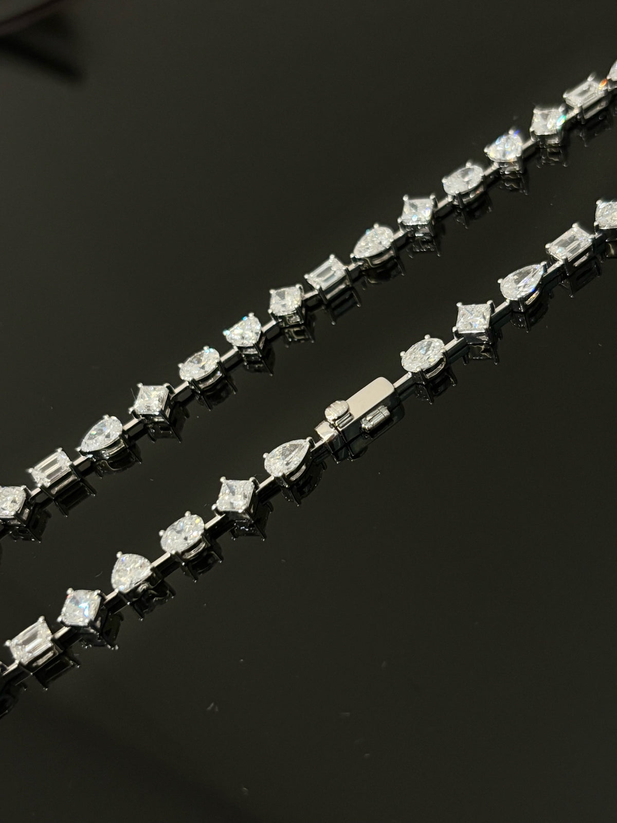 Mixed-cut lab-grown diamond necklace, original folded detail showing clasp and mixed settings