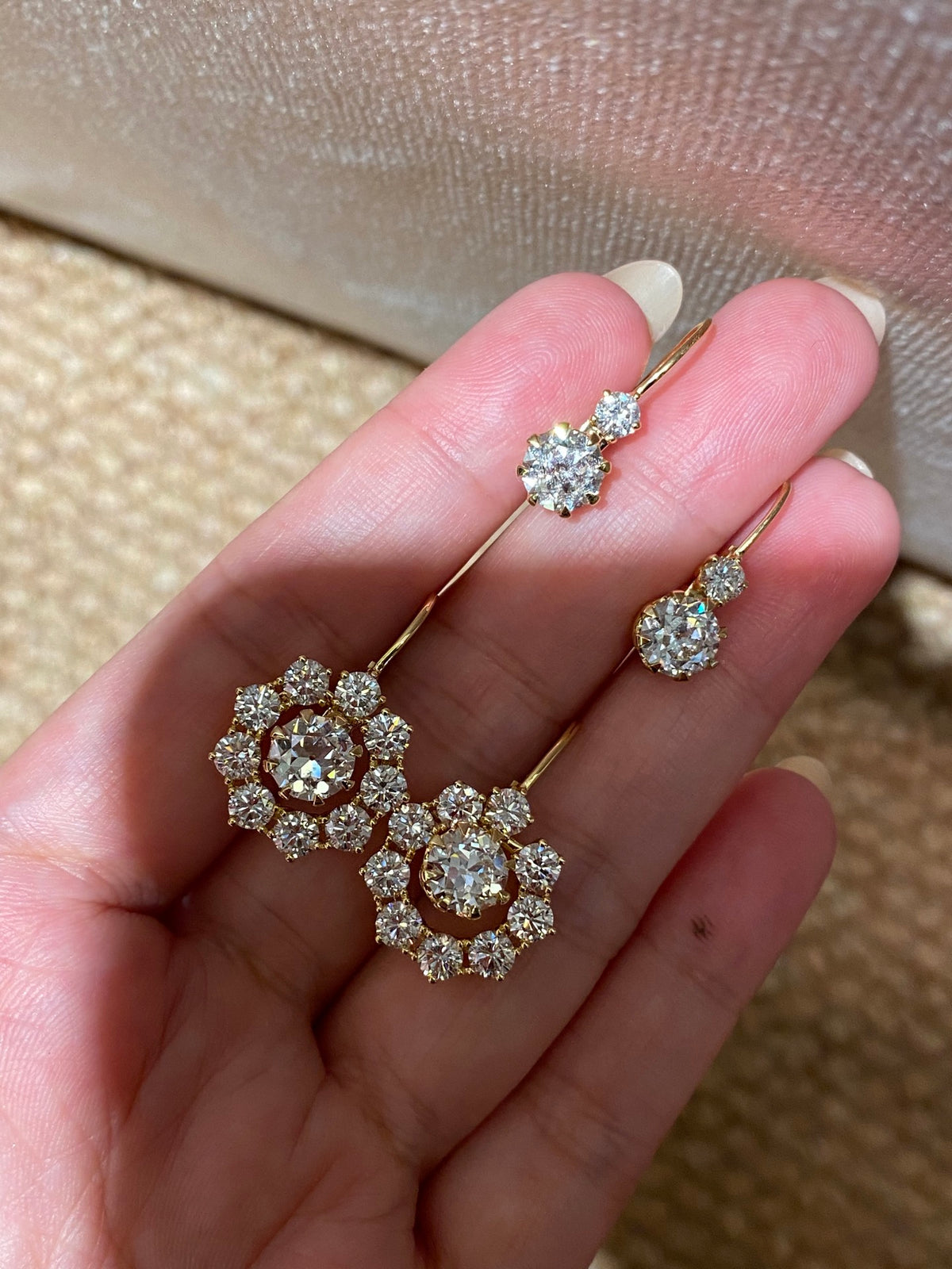 Yellow-metal old European-cut diamond earrings, original view of halo and plain configurations