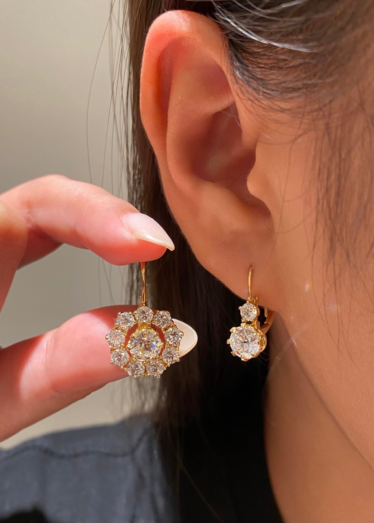 Yellow-metal detachable halo diamond earrings, original wearing comparison1