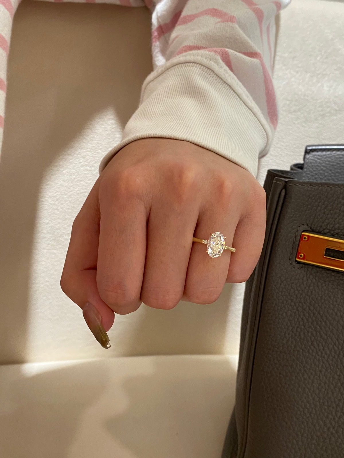Oval diamond bamboo-band ring, original wearing view1