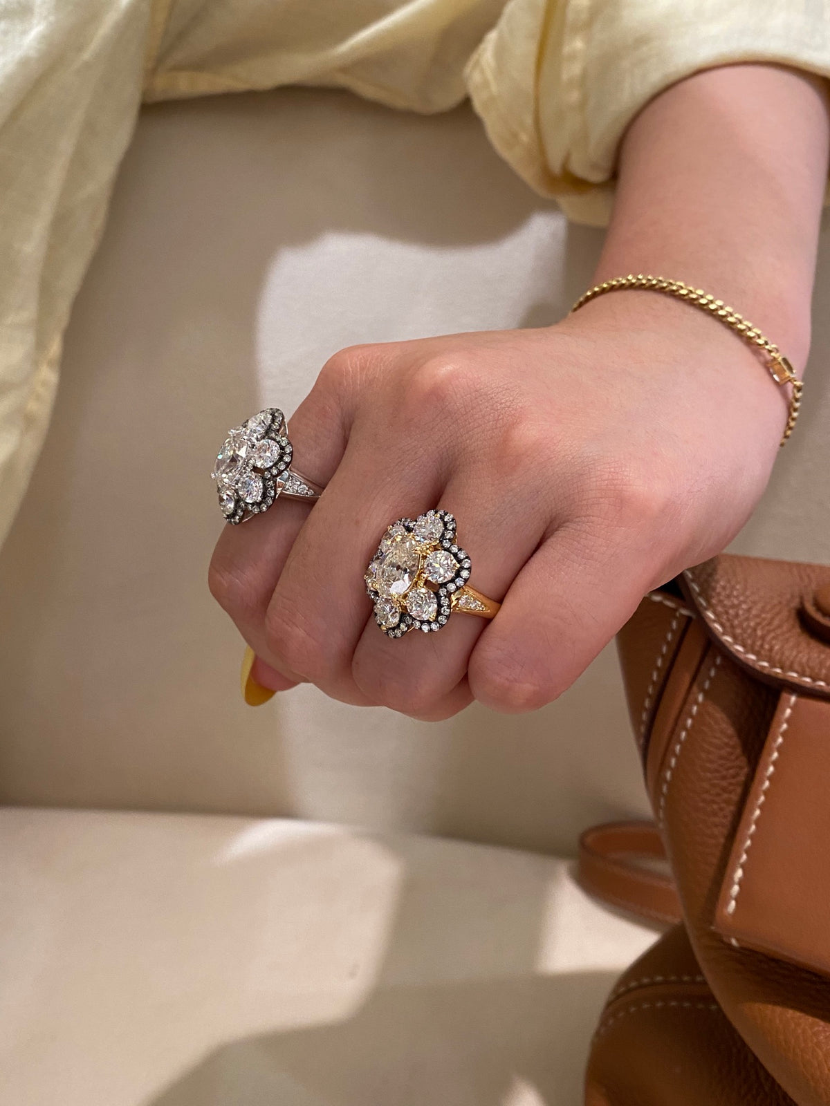 White and yellow-metal floral diamond rings, original side comparison showing diamond-set shoulders