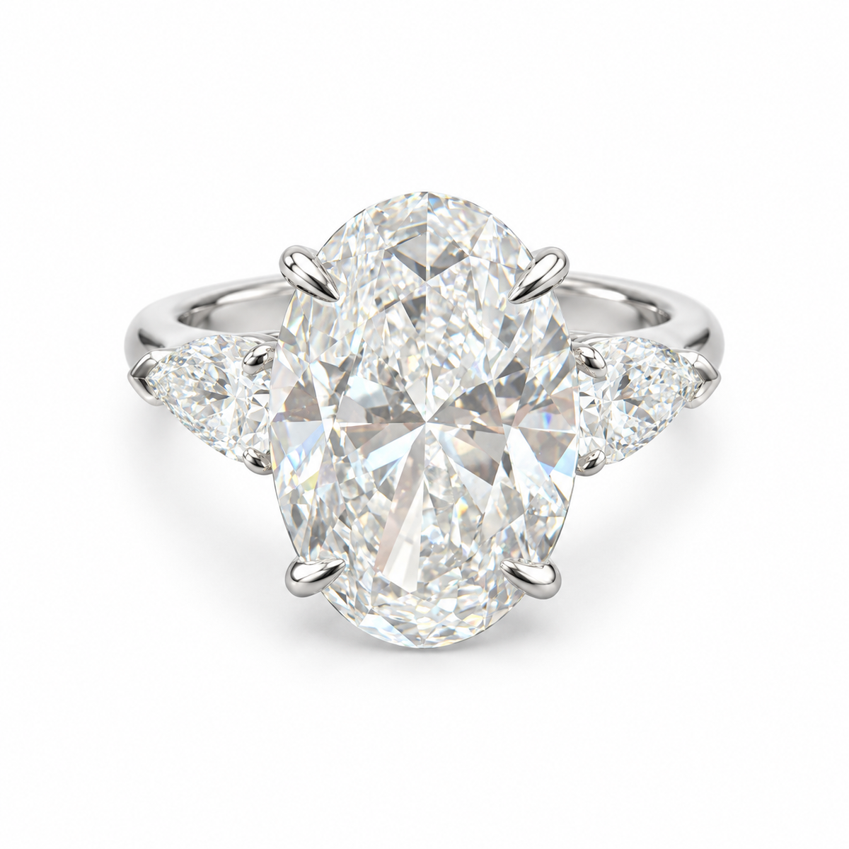 10 ct oval and pear three-stone lab-grown diamond ring in 18K white gold, complete frontal design on white background