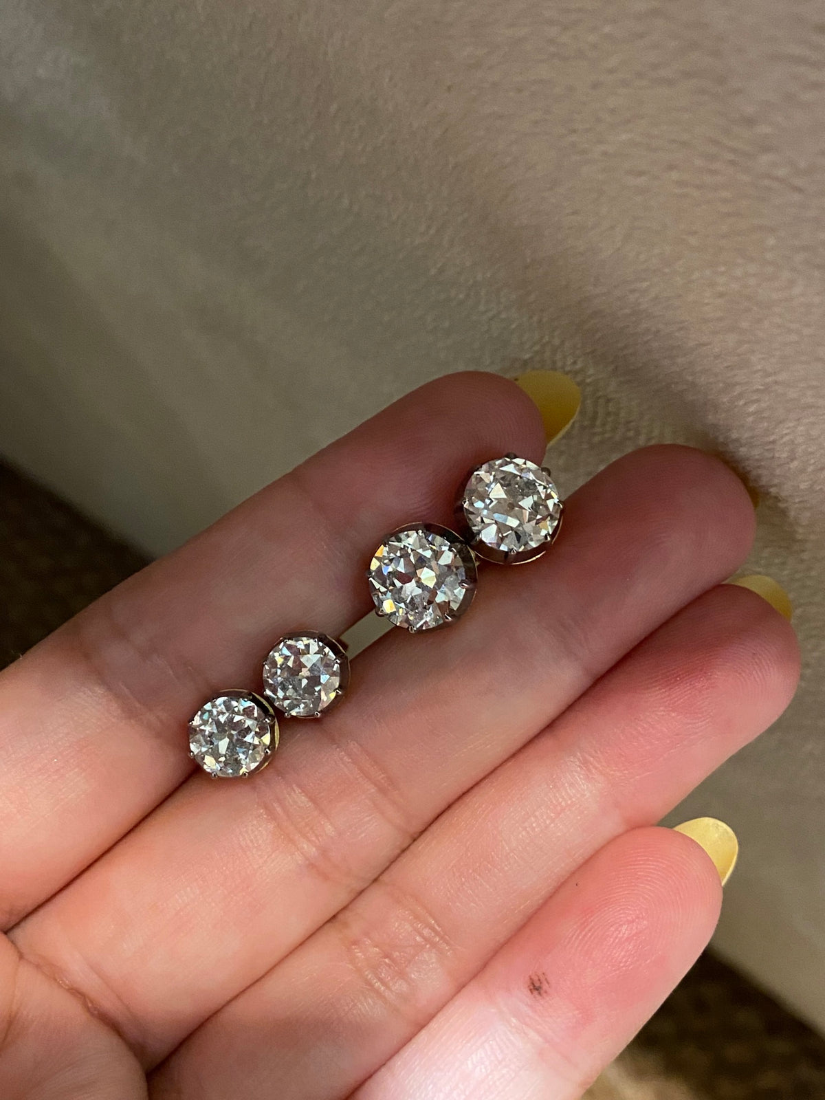 Old European-cut diamond stud earrings, original held comparison of two size options; one selected pair supplied