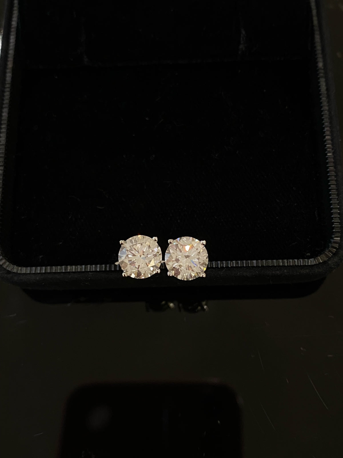 Classic round four-prong diamond studs, original pair view 3