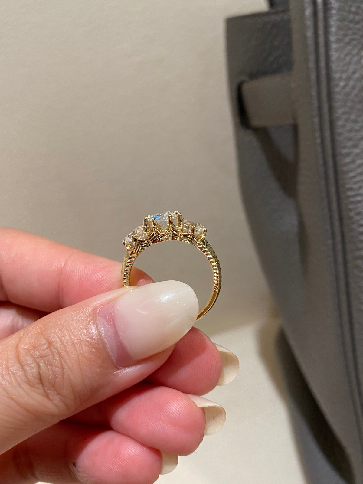 Old Mine-cut three-stone diamond ring, original openwork gallery and ring profile