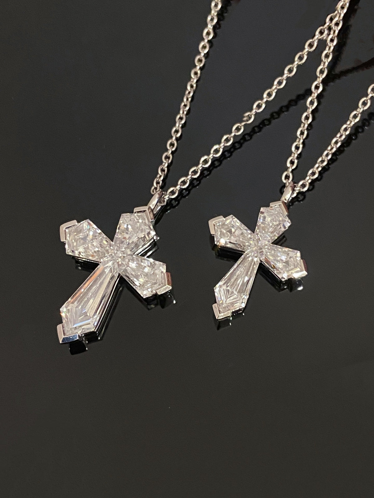 Four-diamond cross necklaces, original two-size comparison; one selected necklace supplied