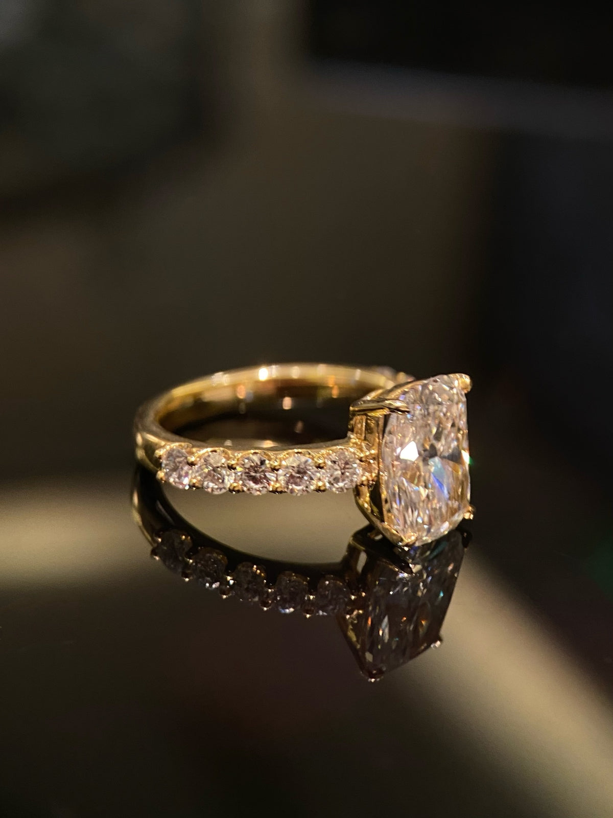 Elongated cushion diamond ring, original yellow-gold side and shoulder detail