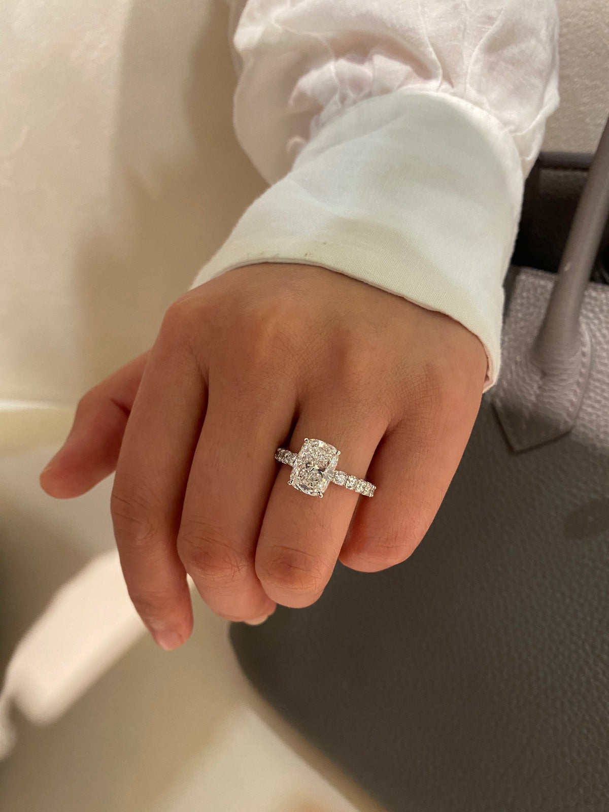 Cushion diamond ring in white gold, original wearing view 1