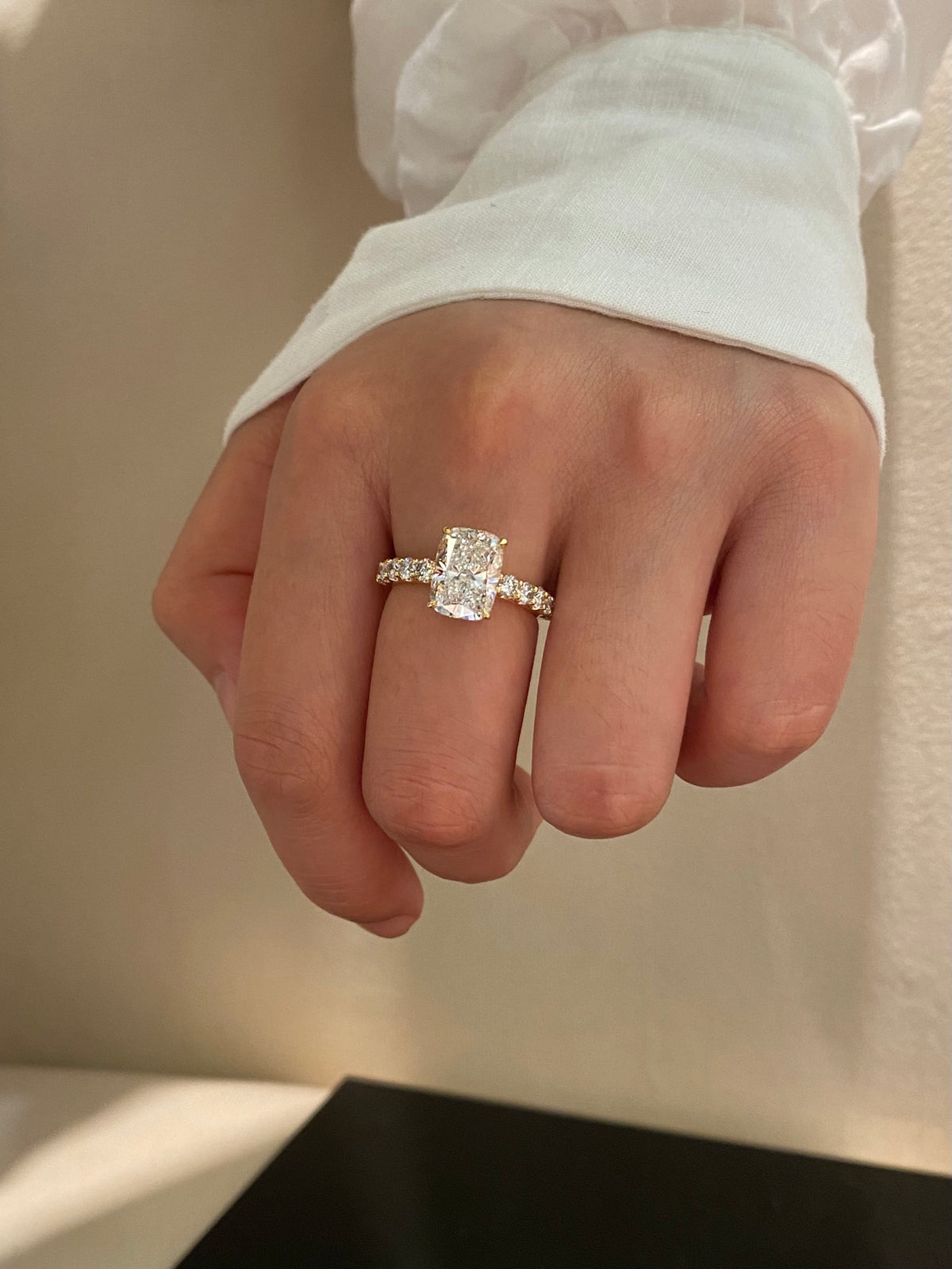 Cushion diamond ring in yellow gold, original wearing view 1