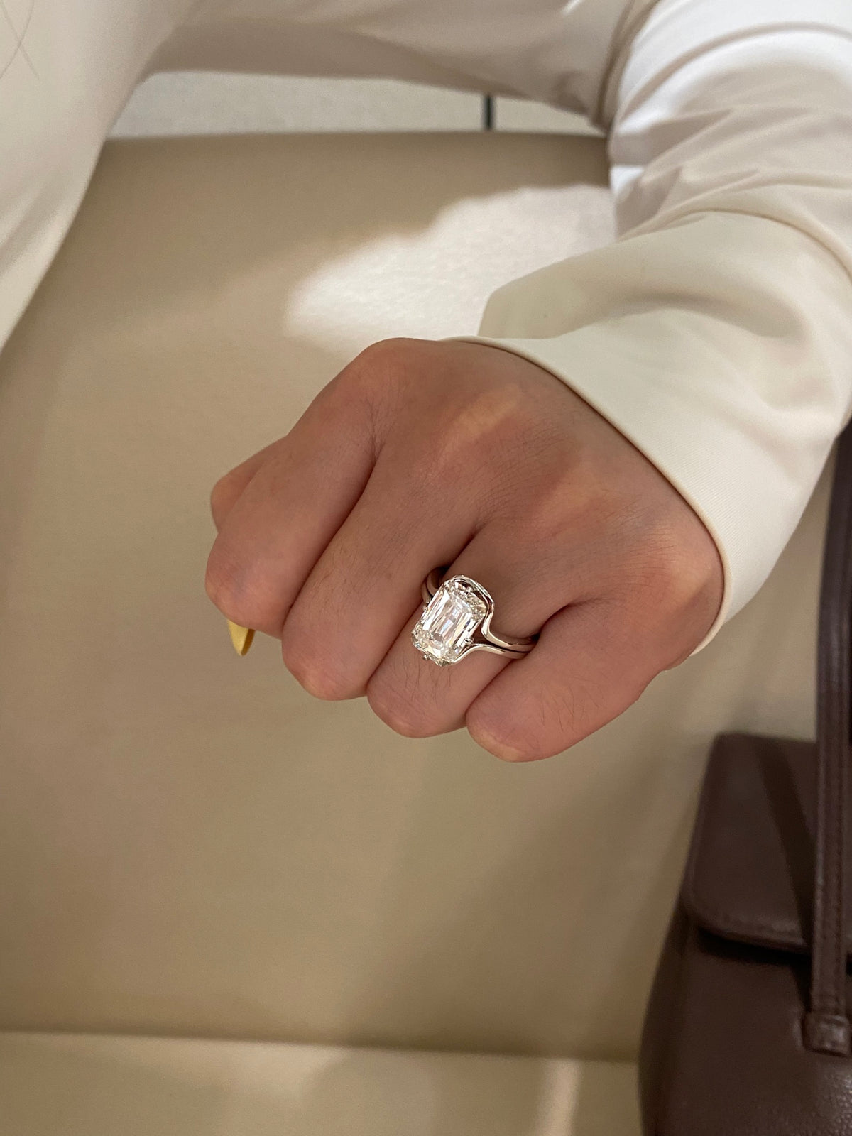 Ashoka-cut diamond ring with curved detachable jacket, original wearing view 1