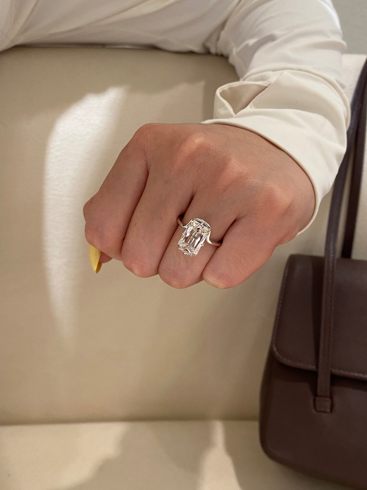 Ashoka-cut main diamond ring worn without the curved outer jacket, original wearing view