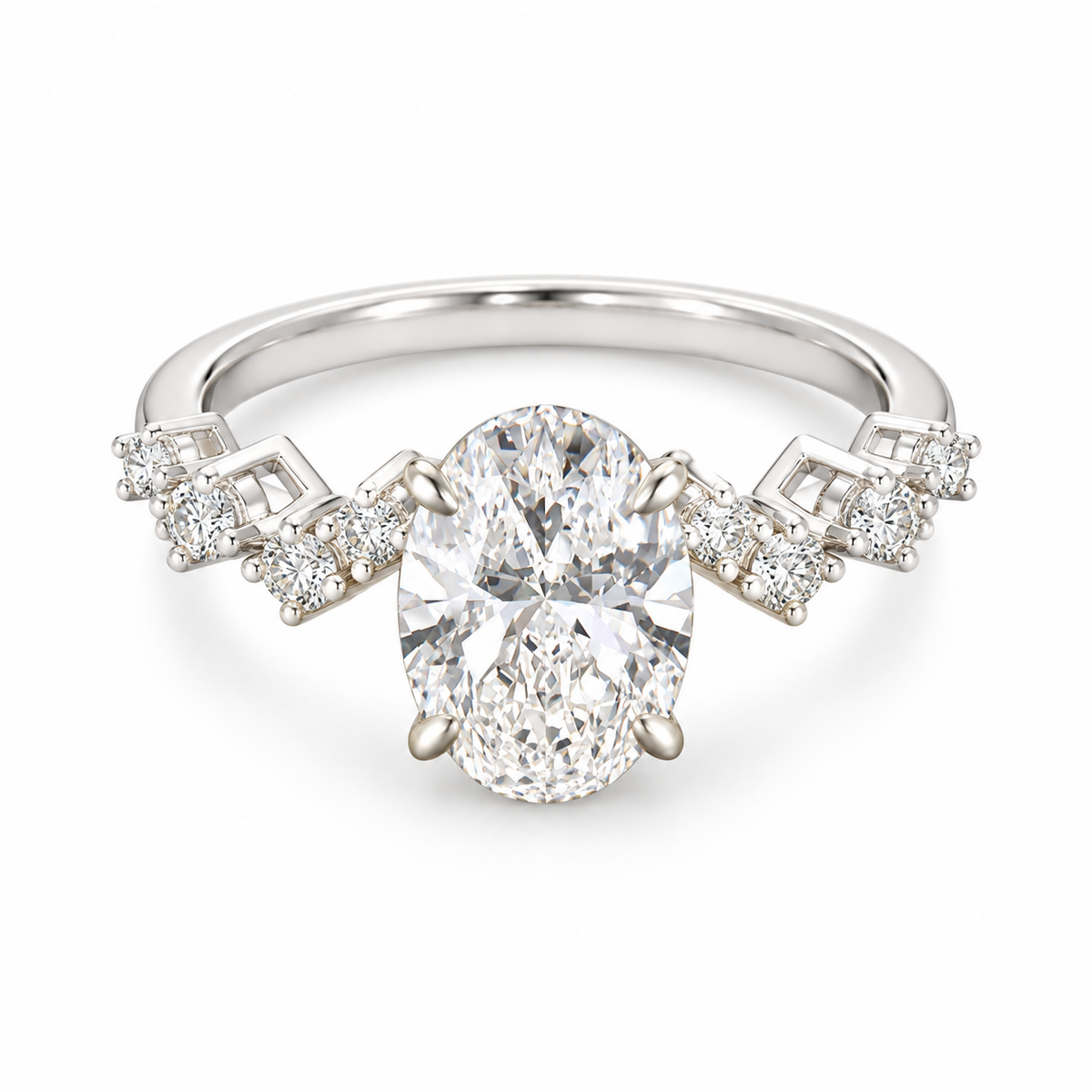 Oval lab-grown diamond ring in 18K white gold with four corner prongs and geometric diamond-set shoulders on white