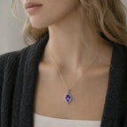 What We Said Without Words — violet topaz pendant, AI-assisted editorial wearing view, cropped blonde editorial v3