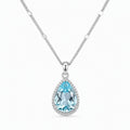 When the Rain Let Go — blue topaz pendant, white-background product view [asset:17e73de340a9]