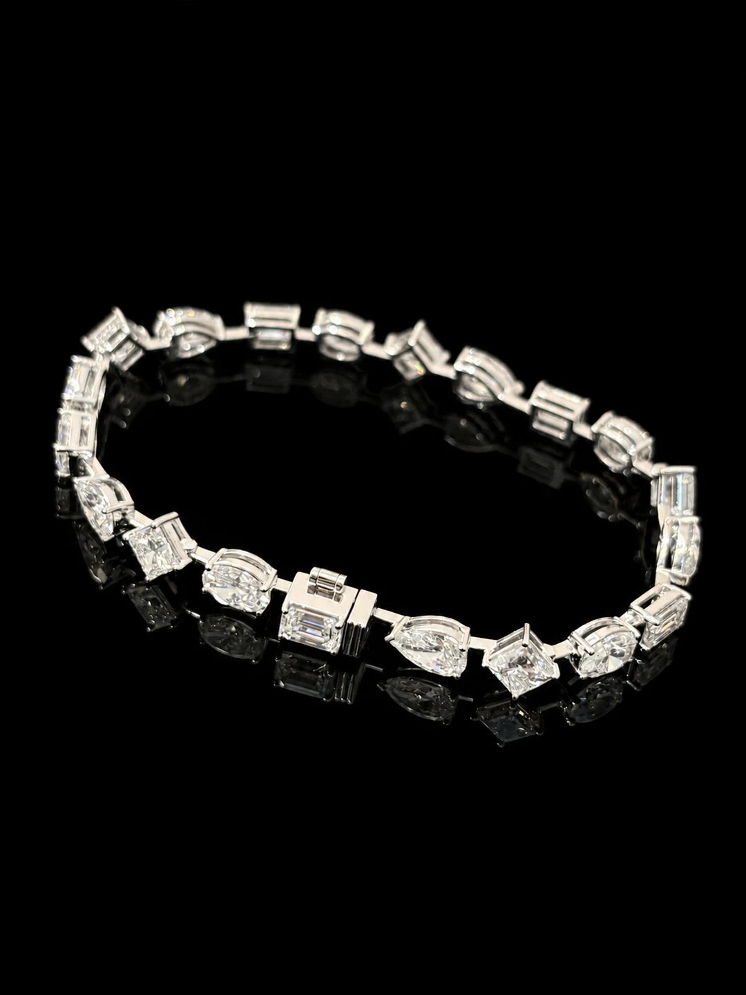Mixed-cut diamond bracelet on black mirrored glass